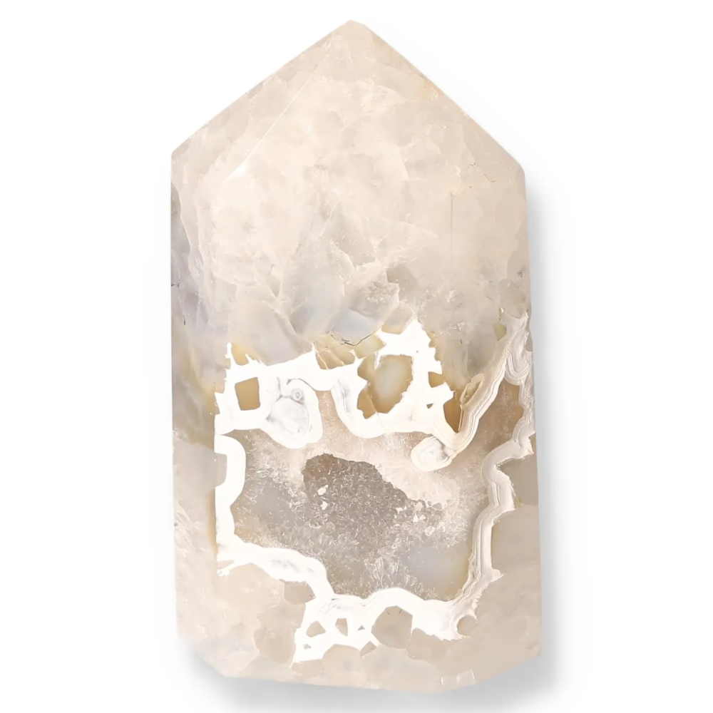 Agate Geoded Points Light beige stone with a round, pale center and subtle banded pattern. 036894